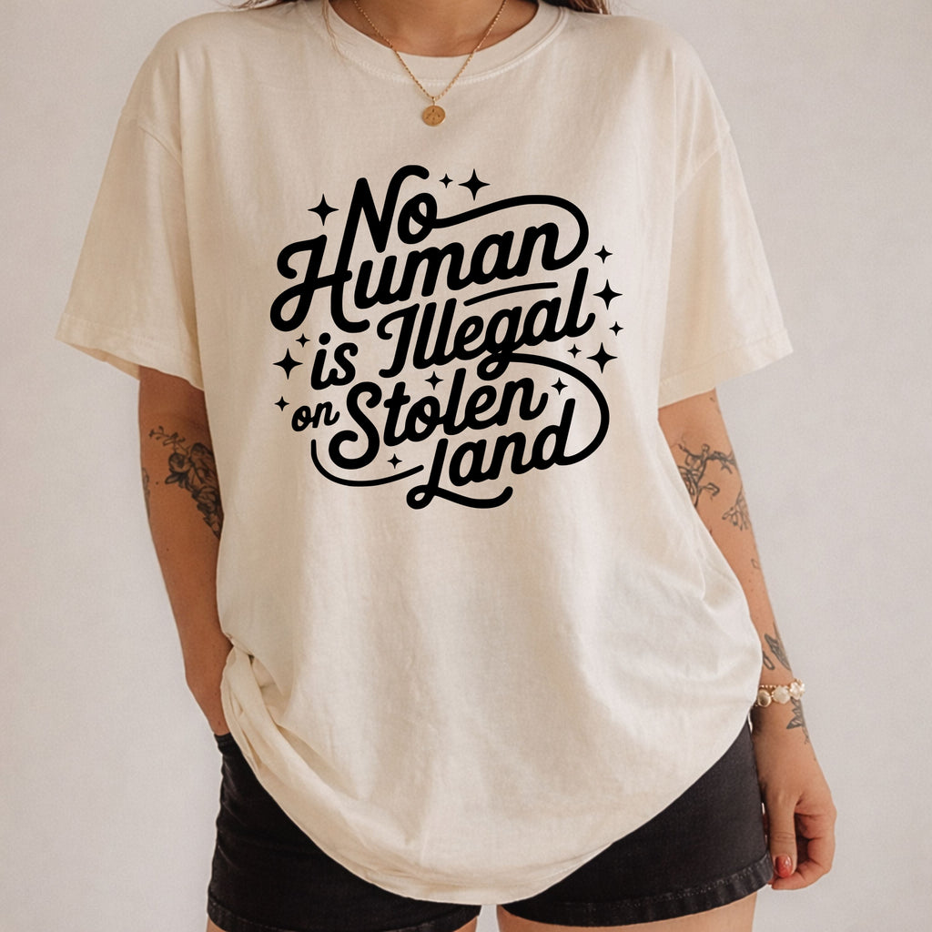 No Human Is Illegal on Stolen Land Graphic Tee